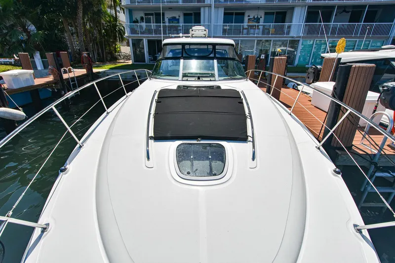 Pure Fun Yacht Photos Pics 2007 Sea Ray 40 Sundancer yacht docked, showcasing sleek design and spacious deck.