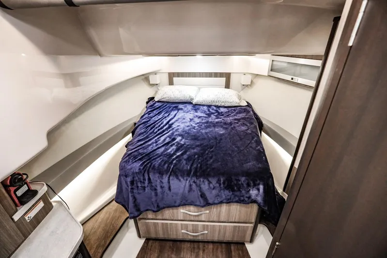  Yacht Photos Pics 2021 Regal 36 Grande Coupe cabin interior with cozy bed and modern design.