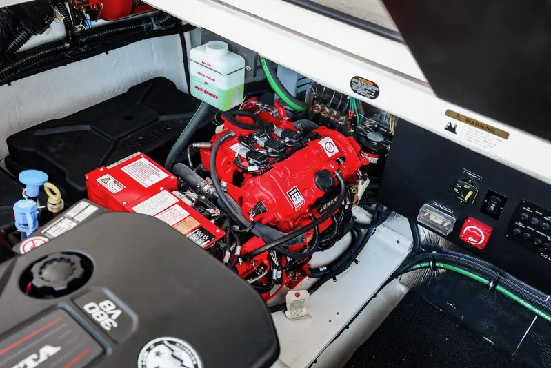  Yacht Photos Pics Engine compartment of 2021 Regal 36 Grande Coupe, showcasing mechanical components and wiring.
