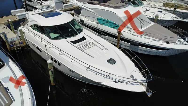  Yacht Photos Pics 2010 Sea Ray 540 Sundancer yacht docked at marina, aerial view.