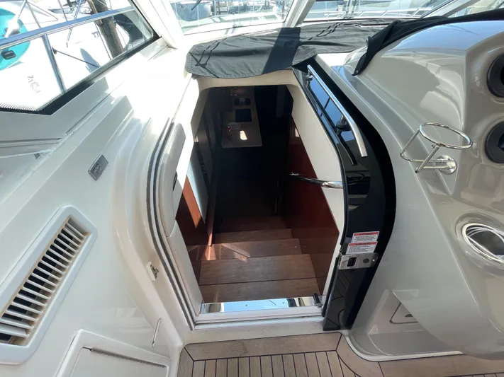  Yacht Photos Pics Interior view of 2010 Sea Ray 540 Sundancer yacht staircase.