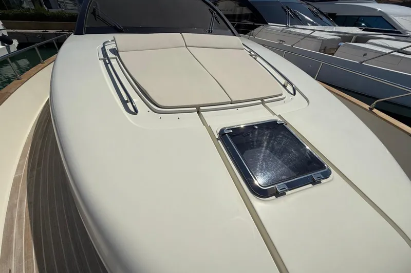  Yacht Photos Pics 2013 Riva 75 Venere Super yacht deck with sunbathing area and hatch.