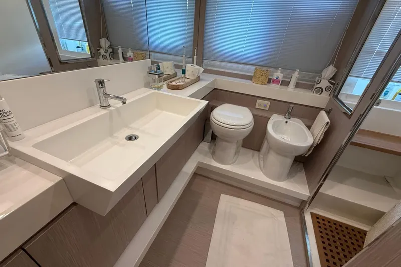  Yacht Photos Pics Luxurious bathroom in 2013 Riva 75 Venere Super yacht with modern fixtures and elegant design.