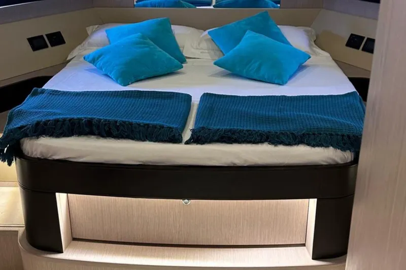  Yacht Photos Pics Luxurious bedroom interior of 2013 Riva 75 Venere Super yacht with teal accents.