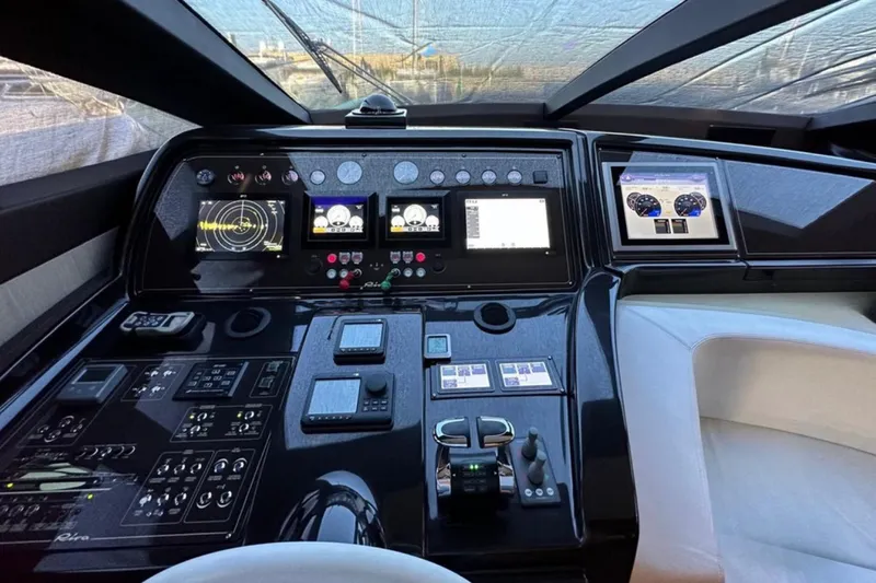  Yacht Photos Pics Control panel of a 2013 Riva 75 Venere Super yacht, featuring advanced navigation systems.
