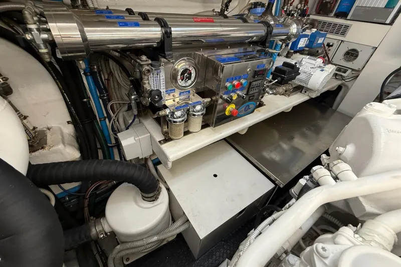  Yacht Photos Pics Engine room of 2013 Riva 75 Venere Super yacht, showcasing complex machinery and components.