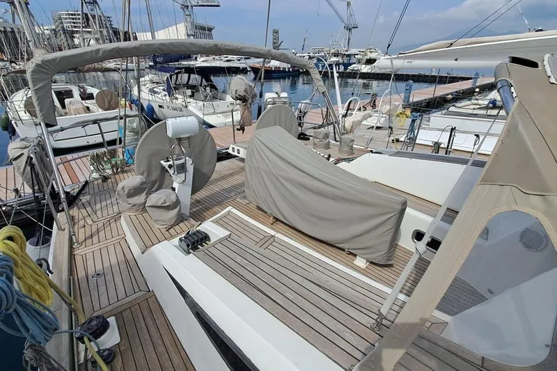  Yacht Photos Pics Luxurious 2009 CNB BORDEAUX 60 yacht docked at marina, showcasing elegant deck design.