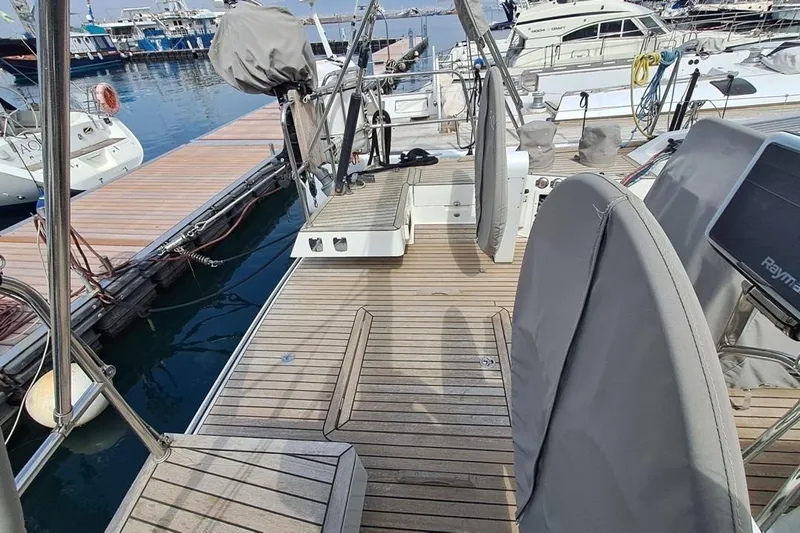  Yacht Photos Pics Deck view of 2009 CNB BORDEAUX 60 yacht docked at marina.