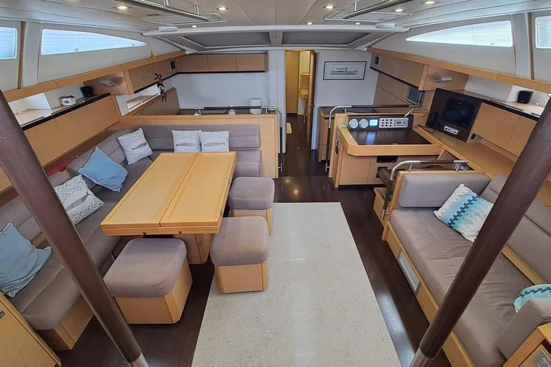  Yacht Photos Pics Luxurious interior of 2009 CNB BORDEAUX 60 yacht with modern seating and dining area.