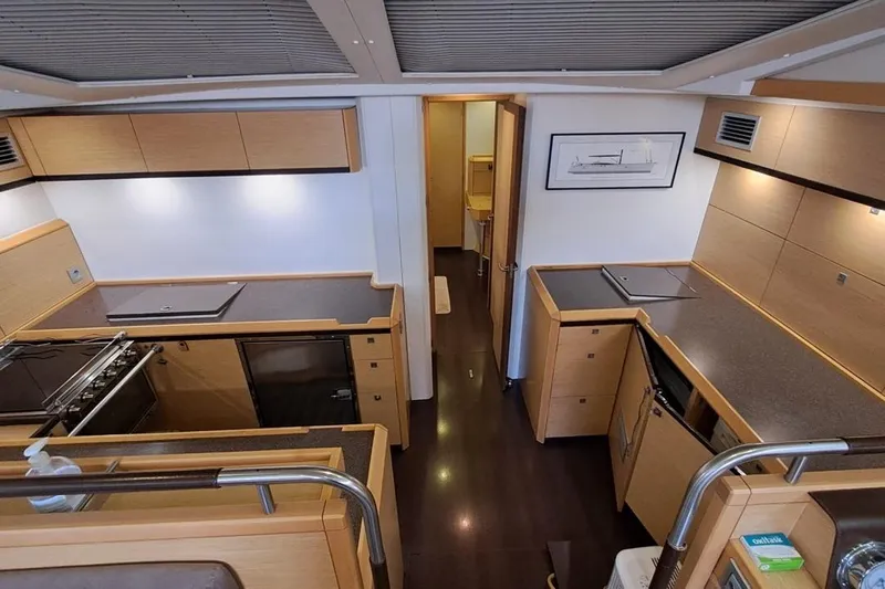  Yacht Photos Pics Luxurious kitchen interior of 2009 CNB BORDEAUX 60 yacht with modern amenities.