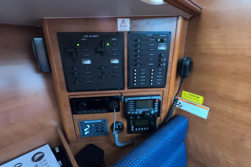 Moon Shadow Yacht Photos Pics Control panel of a 2013 Marlow-Hunter e33 sailboat with communication equipment.
