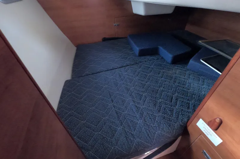 Moon Shadow Yacht Photos Pics 2013 Marlow-Hunter e33 cabin interior with blue patterned cushions.