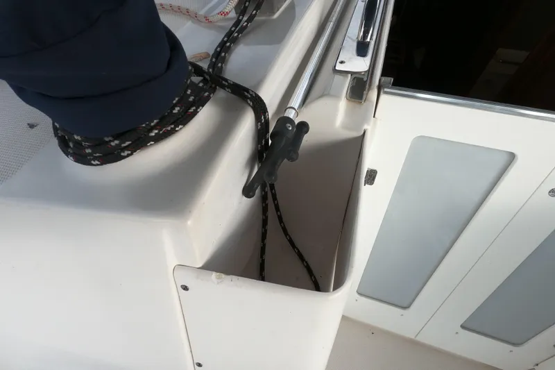 Moon Shadow Yacht Photos Pics 2013 Marlow-Hunter e33 sailboat deck with ropes and cleat.