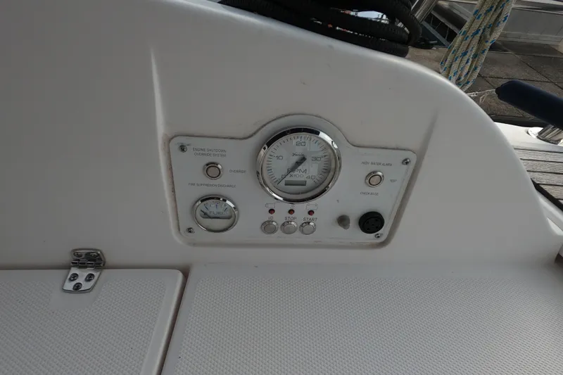 Moon Shadow Yacht Photos Pics Control panel of a 2013 Marlow-Hunter e33 sailboat, featuring gauges and switches.