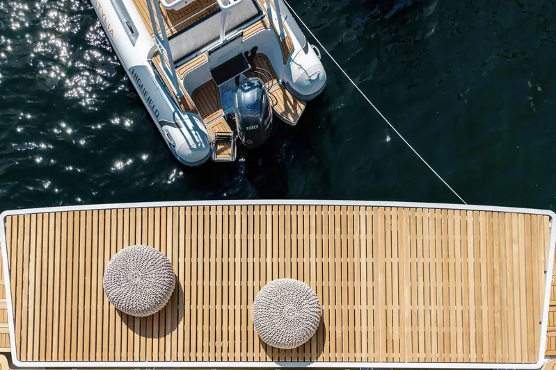  Yacht Photos Pics Aerial view of 2022 Sunreef 60 Sailing yacht deck with tender boat.