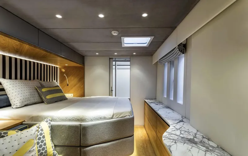  Yacht Photos Pics Luxurious bedroom interior of 2022 Sunreef 60 Sailing yacht with modern design and elegant decor.