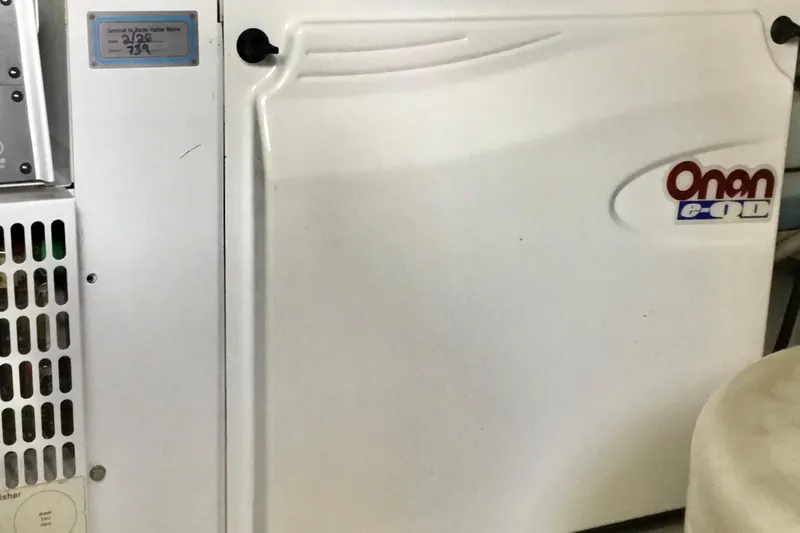 "journeys" Yacht Photos Pics Onan generator panel on 2008 Grand Banks 59 Aleutian RP yacht.