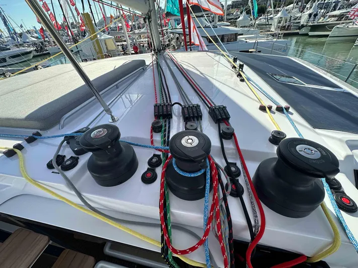 Yacht Photos Pics Deck of NEEL 52 trimaran, showcasing winches and colorful ropes, 2025 model.