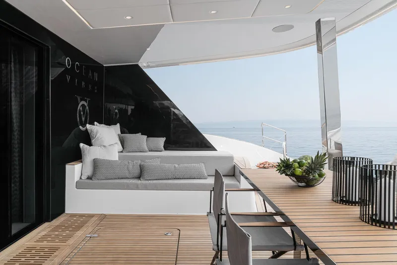  Yacht Photos Pics Luxurious Sunreef 70 yacht deck with modern seating and ocean view, 2026 model.