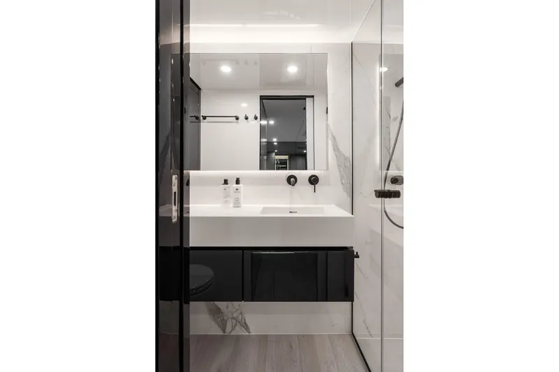  Yacht Photos Pics Luxurious bathroom in 2026 Sunreef 70 yacht with modern fixtures and sleek design.