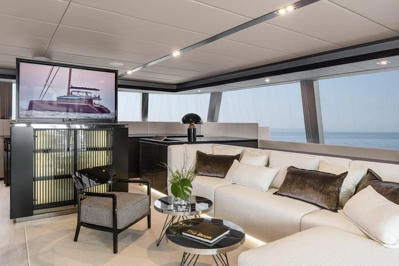  Yacht Photos Pics Luxurious interior of 2026 Sunreef 70 yacht with modern decor and ocean view.