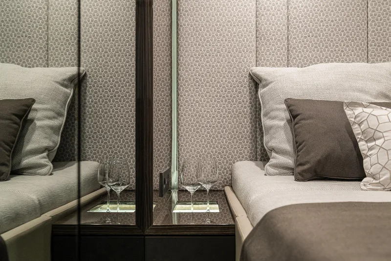  Yacht Photos Pics Luxurious interior of 2026 Sunreef 70 yacht with elegant bedding and decor.