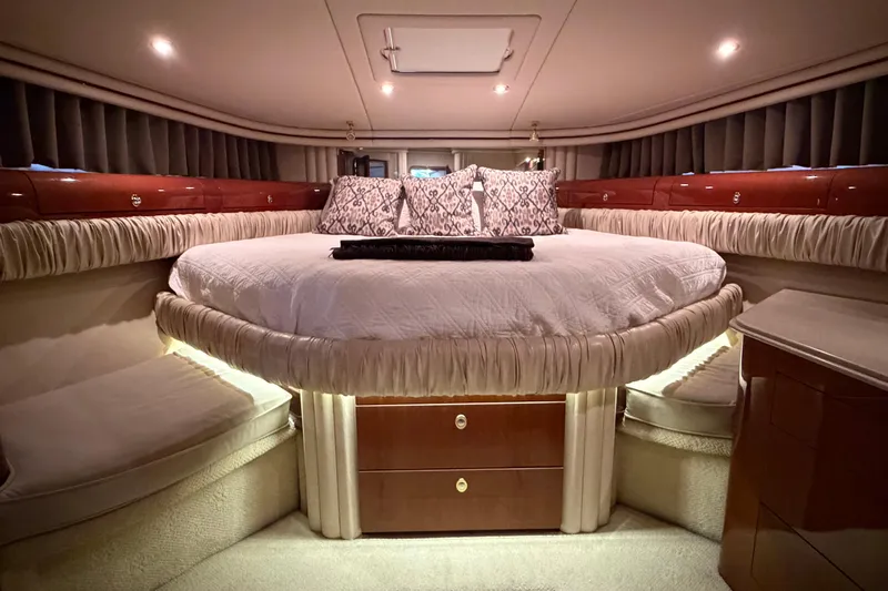 Gusto Yacht Photos Pics Luxurious bedroom interior of 2003 Sea Ray 560 Sedan Bridge yacht.