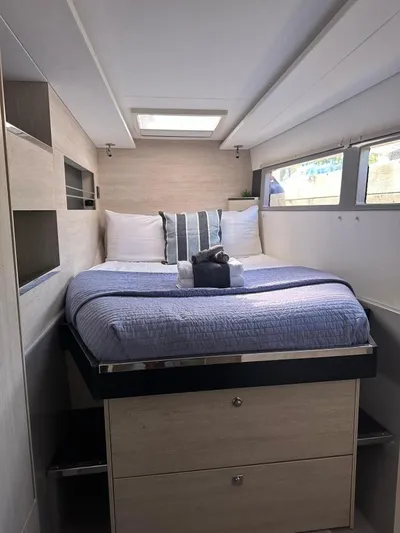 Nice Aft Too Yacht Photos Pics Luxurious cabin interior of 2018 Leopard 45 yacht with cozy bed and modern design.