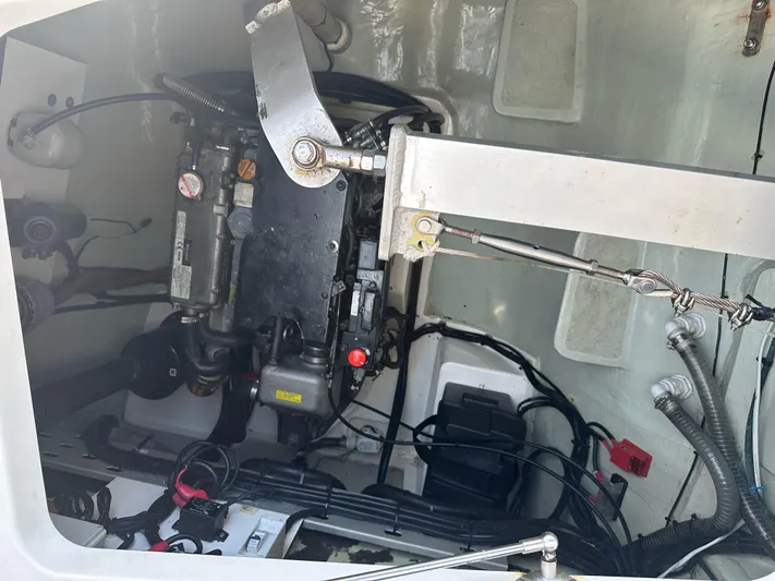 Nice Aft Too Yacht Photos Pics Engine compartment of a 2018 Leopard 45 catamaran, showcasing mechanical components and wiring.