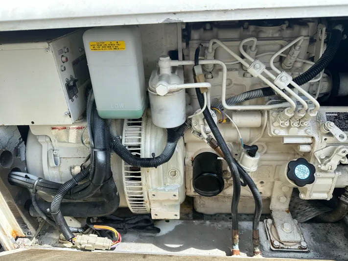 Nice Aft Too Yacht Photos Pics Engine compartment of a 2018 Leopard 45, showcasing mechanical components and wiring.
