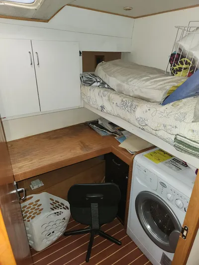 Boss Lady Yacht Photos Pics Laundry and workspace area in a 2001 Ocean Yachts 48 boat.