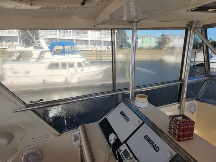 Boss Lady Yacht Photos Pics Interior view of 2001 Ocean Yachts 48, featuring Simrad navigation equipment.