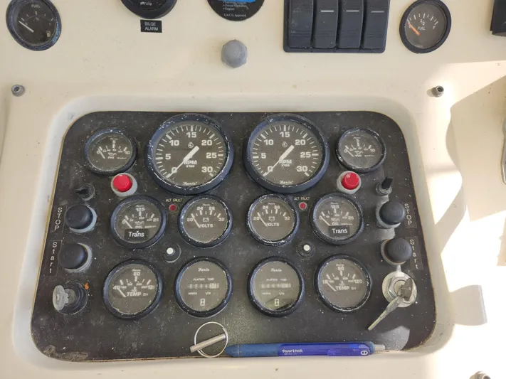 Boss Lady Yacht Photos Pics Dashboard of a 2001 Ocean Yachts 48 boat with various gauges and controls.