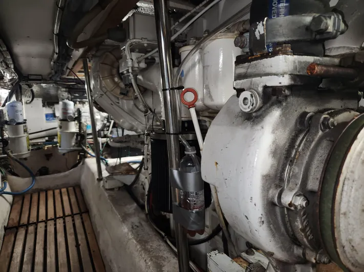 Boss Lady Yacht Photos Pics Engine room of a 2001 Ocean Yachts 48, showcasing mechanical components.