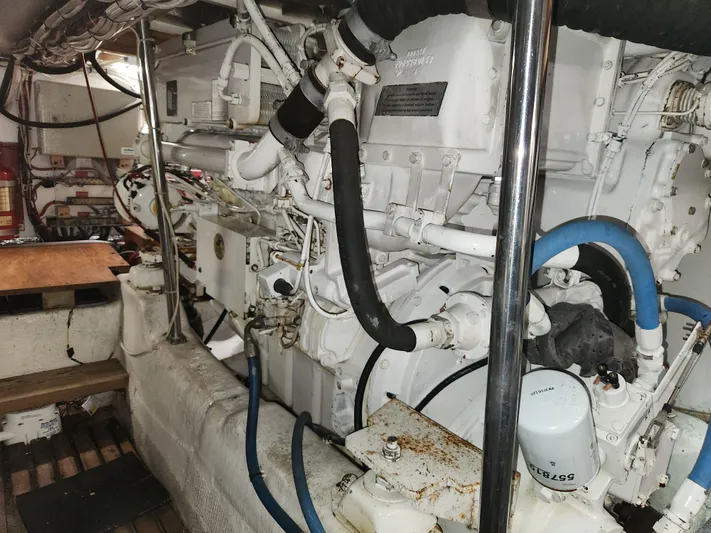 Boss Lady Yacht Photos Pics Engine room of a 2001 Ocean Yachts 48, showcasing mechanical components and wiring.