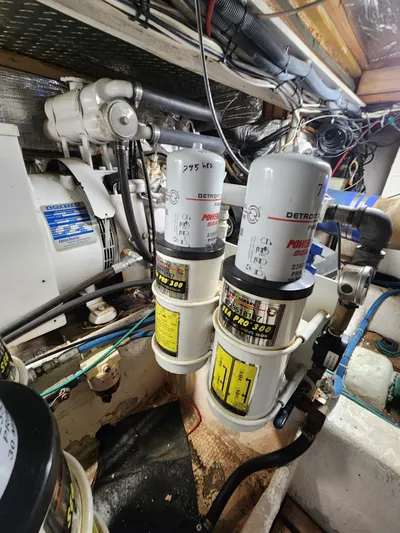 Boss Lady Yacht Photos Pics Engine room of a 2001 Ocean Yachts 48, featuring Detroit Diesel fuel filters.