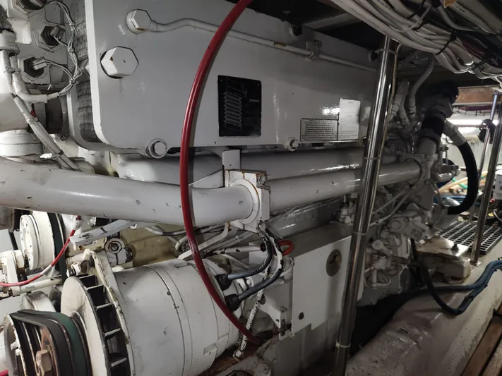 Boss Lady Yacht Photos Pics Engine room of a 2001 Ocean Yachts 48, showcasing mechanical components and wiring.