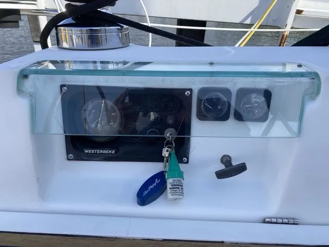 Axis Mundi Yacht Photos Pics Control panel of a 2002 Beneteau 393 sailboat with Westerbeke engine gauges.