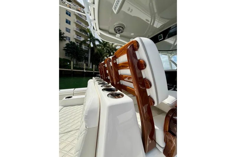 Salty Dogs Yacht Photos Pics 2024 Valhalla Boatworks V-37 interior with luxurious seating and polished wood accents.