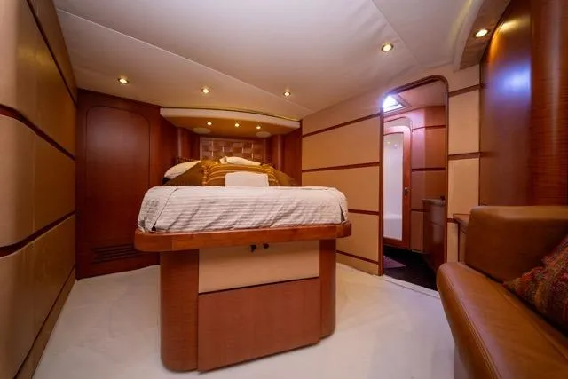  Yacht Photos Pics Luxurious interior of a 1997 Garlington Convertible yacht with elegant wood finishes.