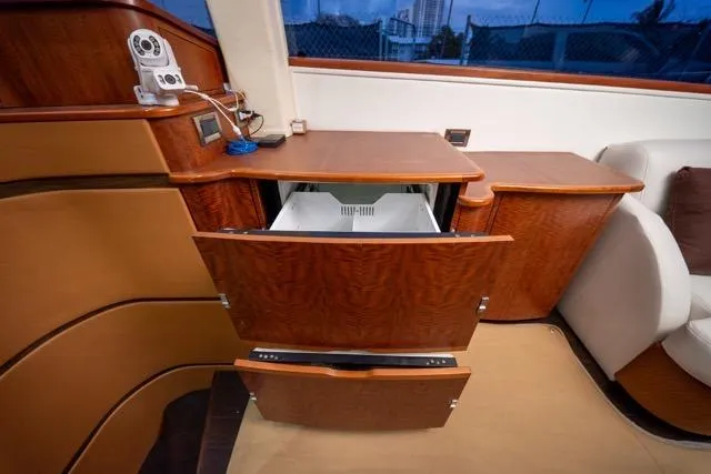  Yacht Photos Pics 1997 Garlington Convertible interior with open wooden cabinets and modern equipment.