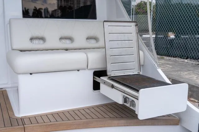  Yacht Photos Pics 1997 Garlington Convertible yacht with built-in grill and cushioned seating.