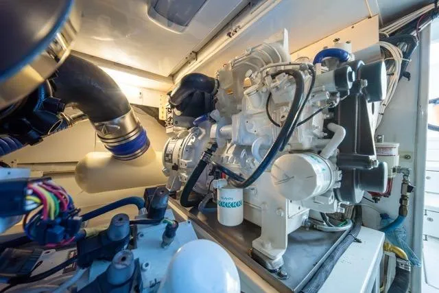  Yacht Photos Pics Engine room of a 1997 Garlington Convertible, showcasing detailed mechanical components.