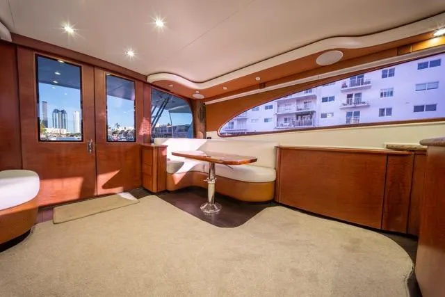  Yacht Photos Pics Luxurious 1997 Garlington Convertible yacht interior with elegant wood finishes and plush seating.