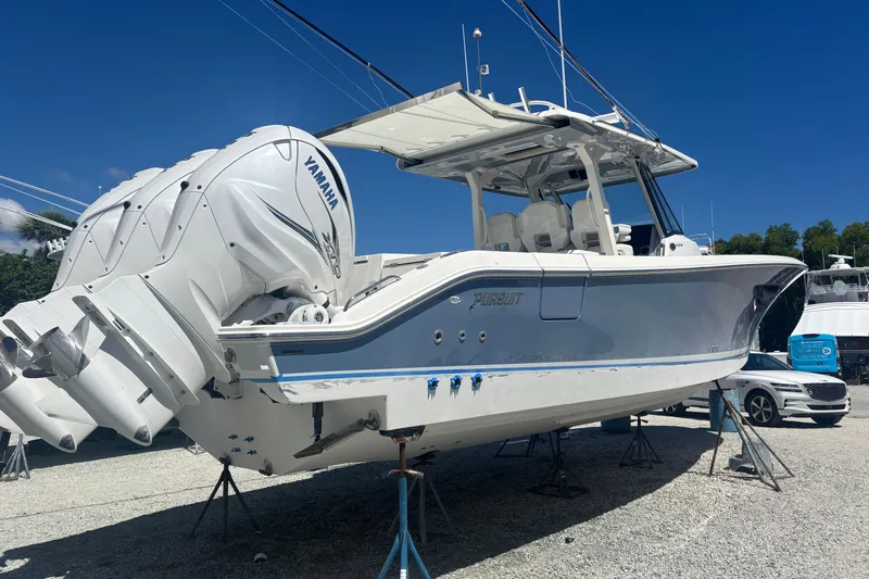  Yacht Photos Pics 2021 Pursuit S 378 Sport boat with Yamaha engines on display outdoors.