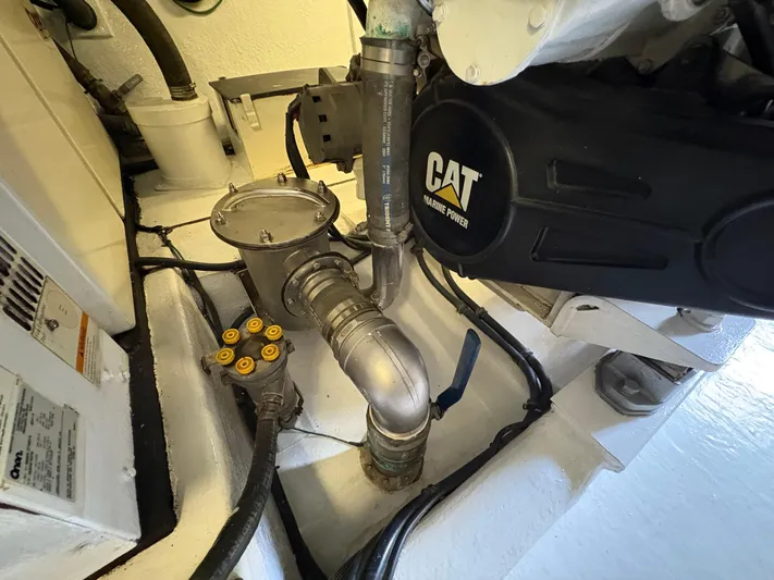 Obelix Yacht Photos Pics Engine room of 2006 Riviera 60 Flybridge with CAT marine power components.