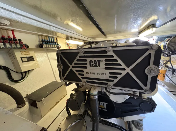 Obelix Yacht Photos Pics Engine room of 2006 Riviera 60 Flybridge with CAT Marine Power engine.