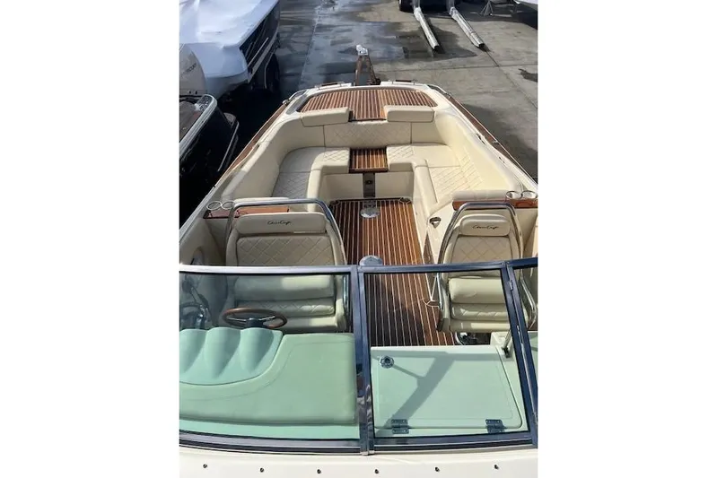  Yacht Photos Pics 2017 Chris-Craft Corsair 32 boat interior with luxurious seating and wood accents.