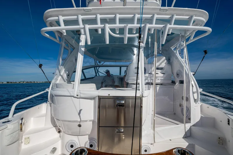 Rising Tide Yacht Photos Pics 2023 Intrepid 477 Evolution boat on open water, showcasing sleek design and modern features.