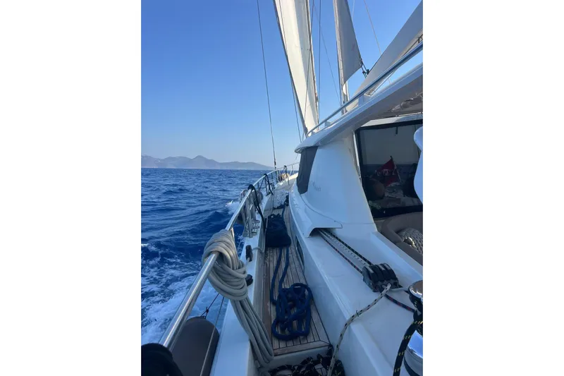 Moody Ds 54 Yacht Photos Pics Sailing on a 2019 Moody DS 54 yacht in open sea, clear blue sky.